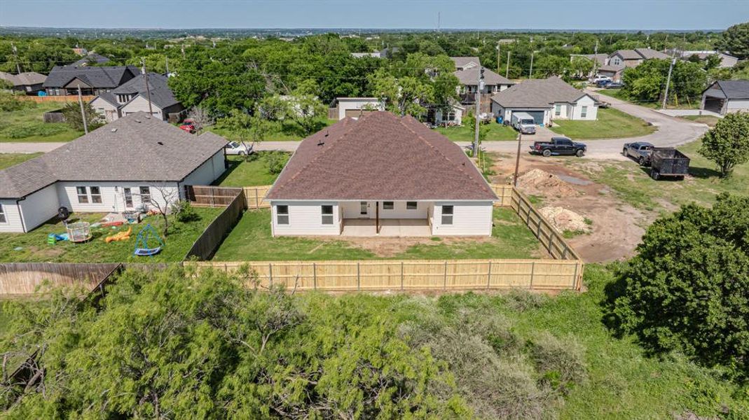 Exterior details and patio area of a home in , Granbury (Image 24).