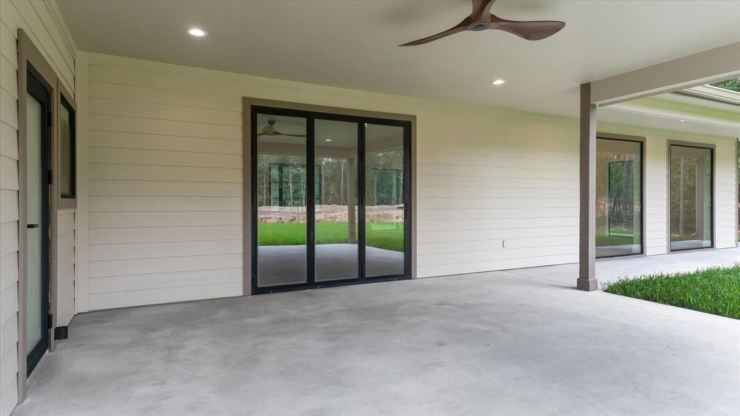 Exterior details and patio area of a home in , Conroe (Image 20).