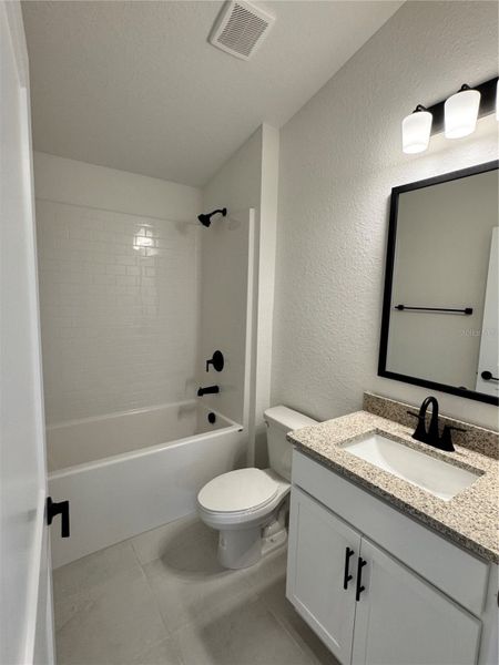 Furnished interior view inside a new home in Watercress Cove, North Port (Image 5).