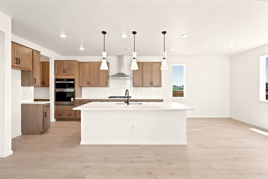Furnished interior view inside a new home in Cordovan, Firestone (Image 9).