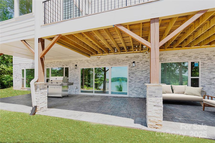 Virtually staged lake front covered patio is ready for your outdoor kitchen Virtually staged lake front covered patio is ready for your outdoor kitchen