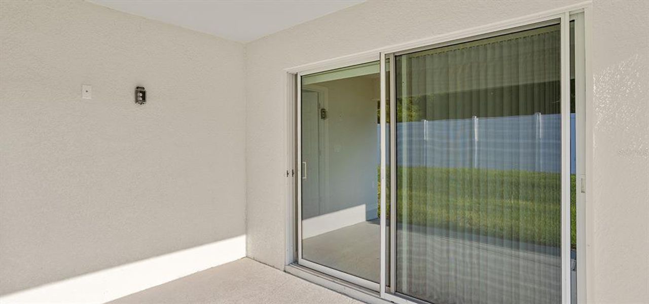 Exterior details and patio area of a home in Falls of Ocala, Ocala (Image 2).