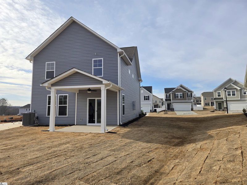 Exterior details and patio area of a home in Halton Oaks, Spartanburg (Image 19).