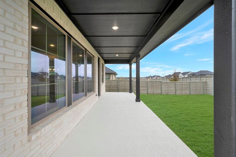 Exterior details and patio area of a home in Treeline, Justin (Image 3). Exterior details and patio area of a home in Treeline, Justin (Image 3).