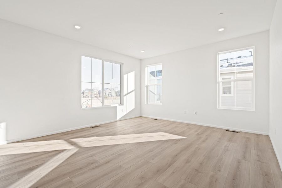 Spacious, unfurnished interior of a new home in The Nest Classic at Canyon Creek, Erie (Image 14).