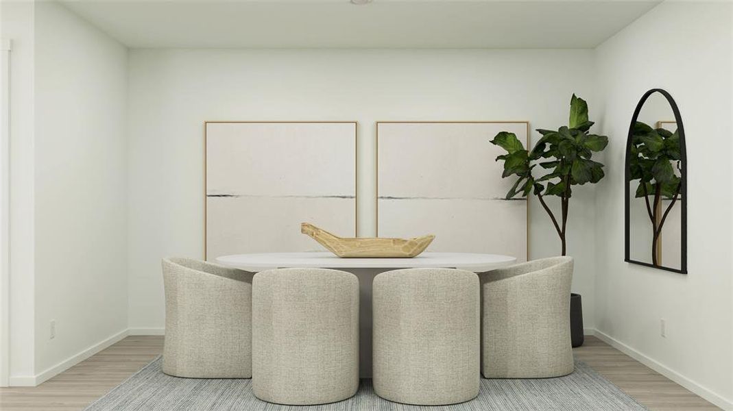 Dining room with hardwood / wood-style floors