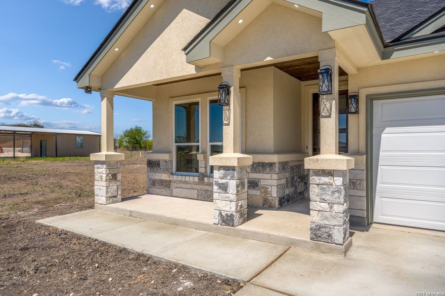 Exterior details and patio area of a home in , Atascosa (Image 23).