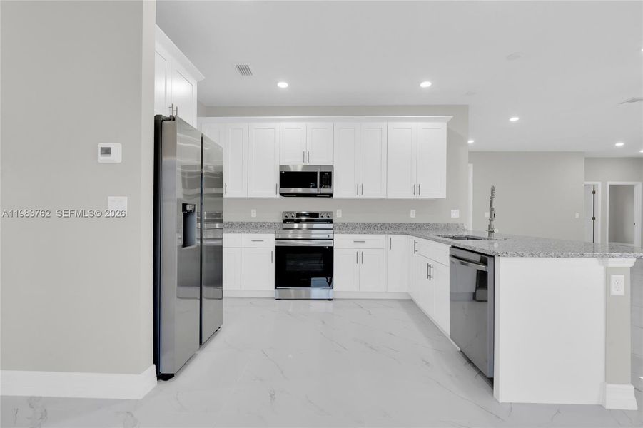 Furnished interior view inside a new home in , Lehigh Acres (Image 7).