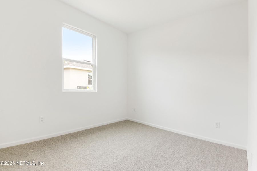 Spacious, unfurnished interior of a new home in Seasons at Grandview Gardens, Deland (Image 13).