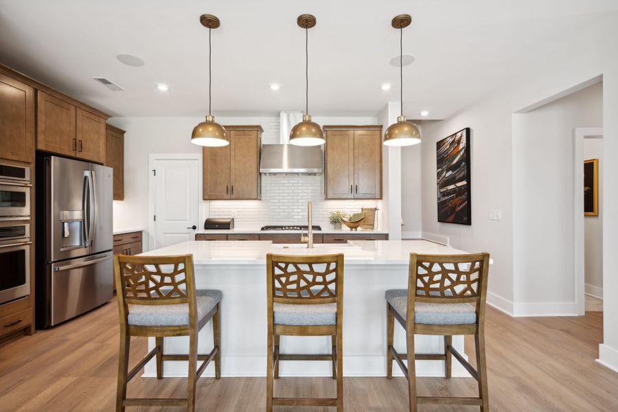 Representative furnished interior of a home built from the Torrence by Tri Pointe Homes in Seven Oaks, Belmont (Image 12).