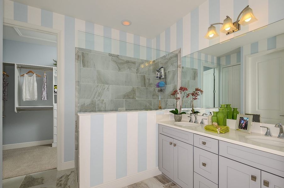 Representative furnished interior of a home built from the White Star by Neal Communities in SkySail, Naples (Image 13).