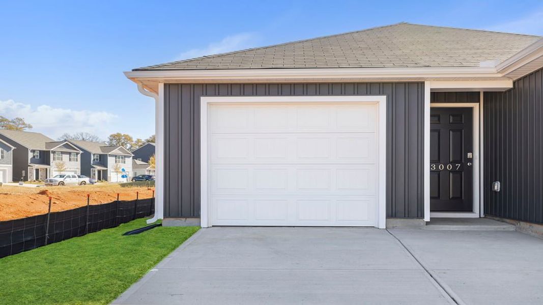 Exterior details and patio area of a home in Harper Ridge, Roebuck (Image 3).
