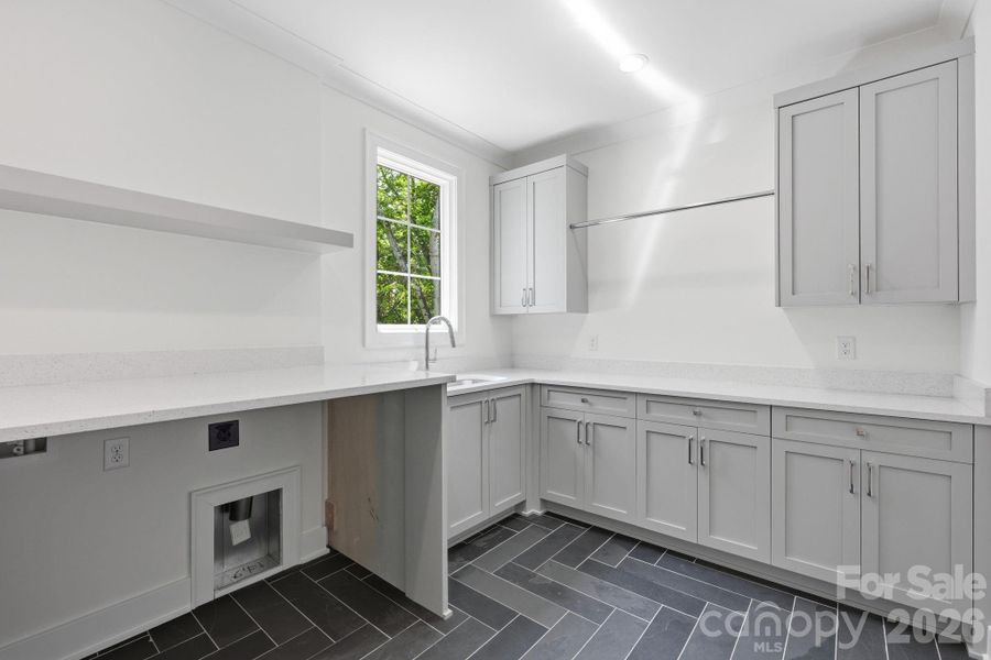 large laundry room located on second level large laundry room located on second level