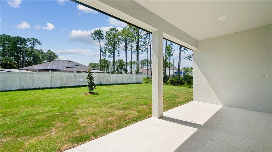 Exterior details and patio area of a home in Palm Coast, Palm Coast (Image 3). Exterior details and patio area of a home in Palm Coast, Palm Coast (Image 3).
