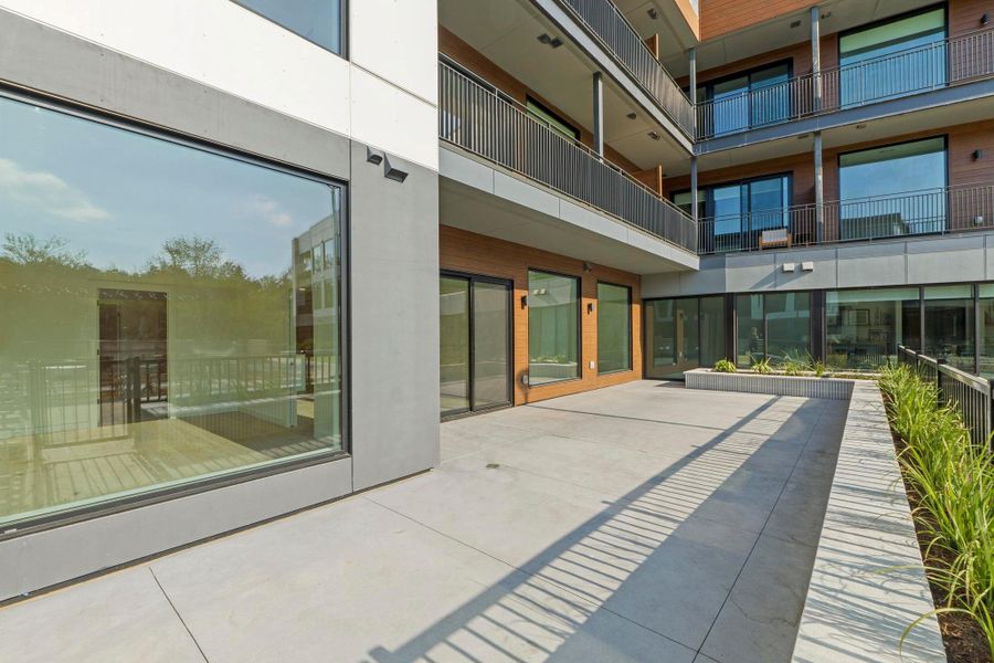 Exterior details and patio area of a home in One Oak, Austin (Image 21).