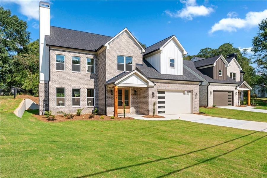 Front exterior of a new home in , Lawrenceville, GA, highlighting curb appeal (Image 28). Front exterior of a new home in , Lawrenceville, GA, highlighting curb appeal (Image 28).