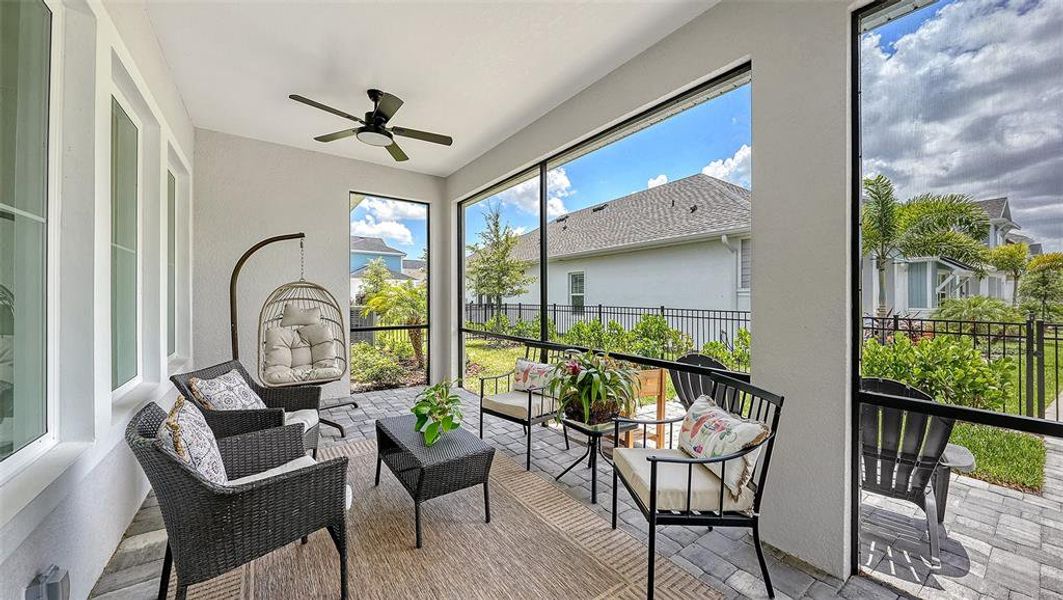 Exterior details and patio area of a home in Emerald Landing at Waterside at Lakewood Ranch – Lake Series, Sarasota (Image 27).