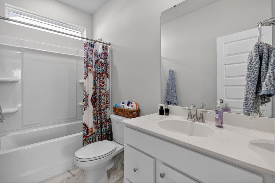 Furnished interior view inside a new home in Sweetgrass at Summers Corner, Summerville (Image 42).
