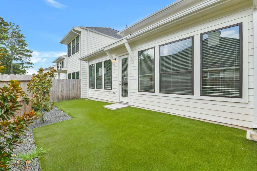 Exterior details and patio area of a home in Summer Place  35', Montgomery (Image 32).