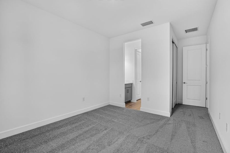 Representative unfurnished interior of a home built from the Abaco by Taylor Morrison in Ardisia Park, New Smyrna Beach (Image 40).