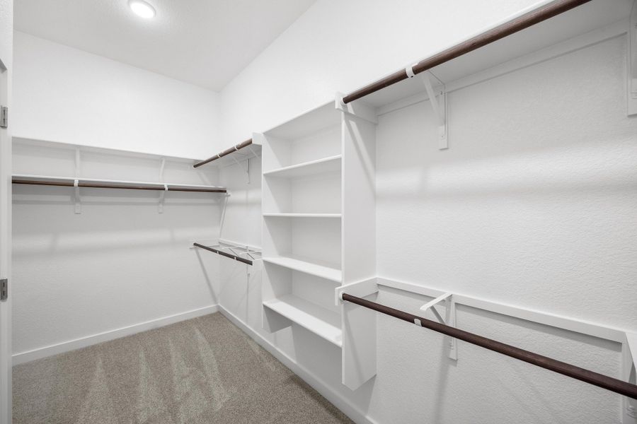 Primary Closet in the Elm home plan by Trophy Signature Homes – REPRESENTATIVE PHOTO Primary Closet in the Elm home plan by Trophy Signature Homes – REPRESENTATIVE PHOTO