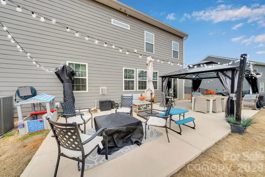 Exterior details and patio area of a home in Falls Cove at Lake Norman, Troutman (Image 4).