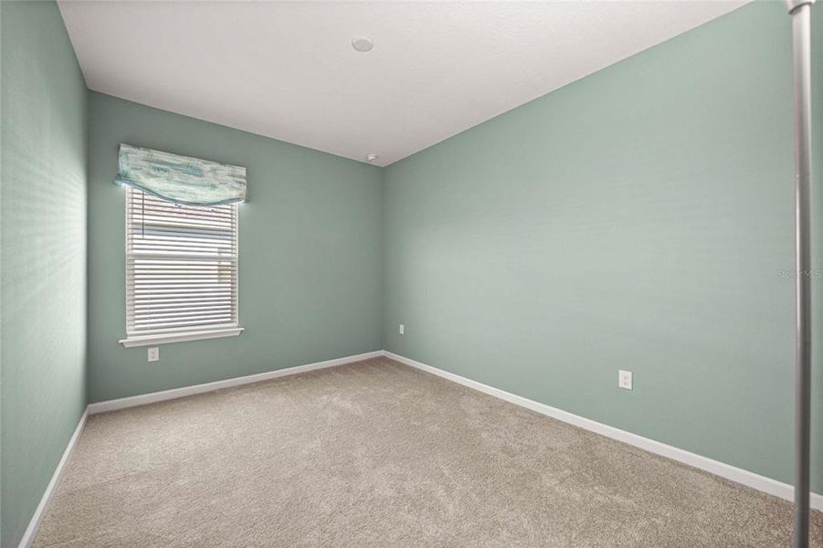 Spacious, unfurnished interior of a new home in Heath Preserve, Ocala (Image 31).