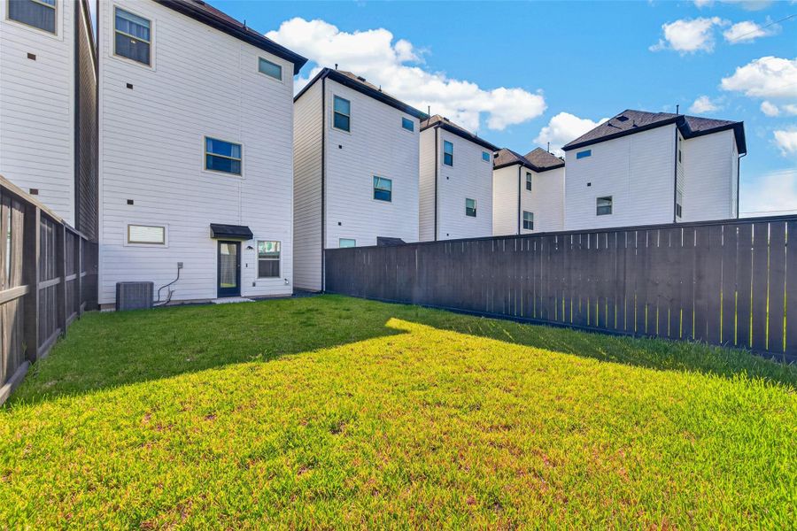 Exterior details and patio area of a home in , Houston (Image 27).