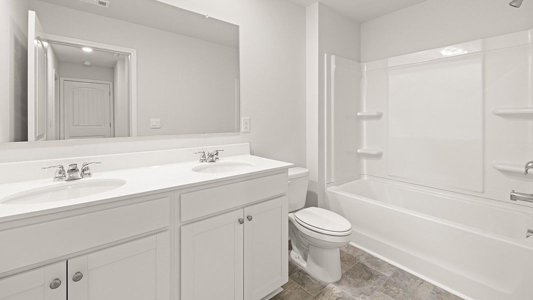 Furnished interior view inside a new home in Greyton Springs Place, Buford (Image 12).