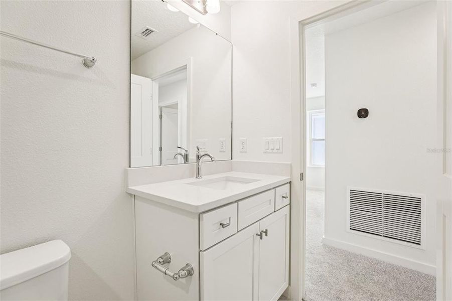 Furnished interior view inside a new home in Trinity Place, St. Cloud (Image 5).