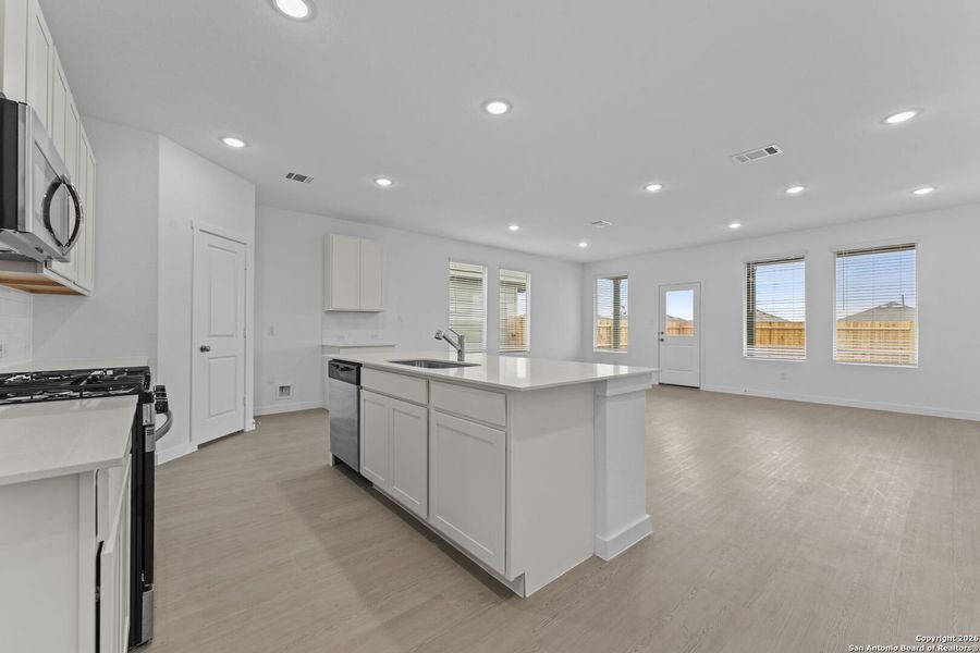 Furnished interior view inside a new home in Voss Farms, New Braunfels (Image 9).