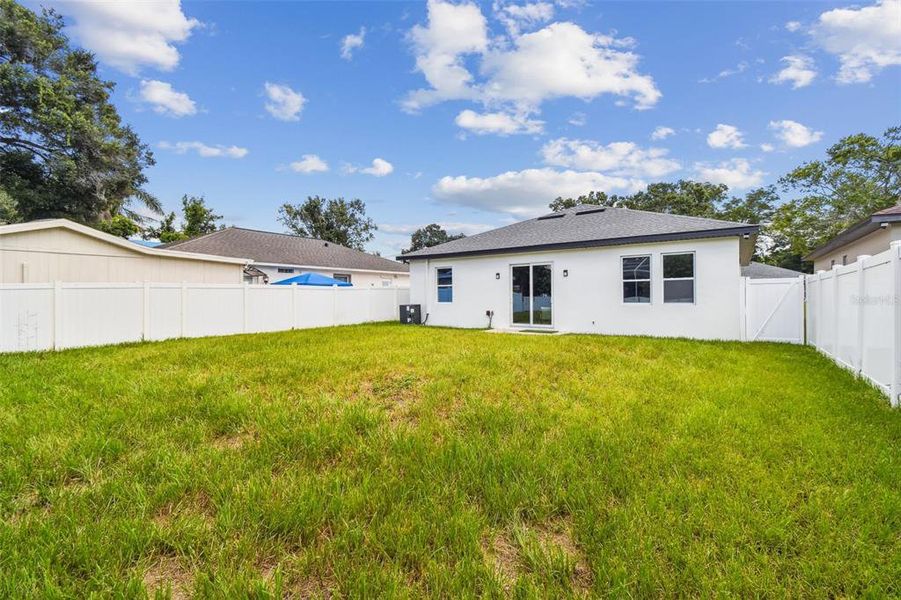 Front exterior of a new home in , Tampa, FL, highlighting curb appeal (Image 30).
