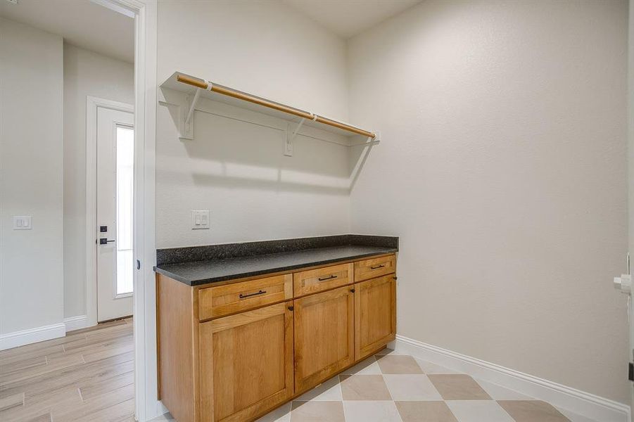 Washroom featuring baseboards Washroom featuring baseboards