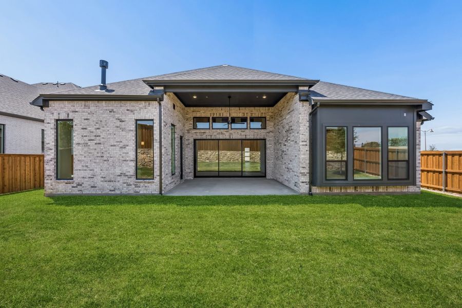 Exterior details and patio area of a home in StarView, Prosper (Image 3). Exterior details and patio area of a home in StarView, Prosper (Image 3).