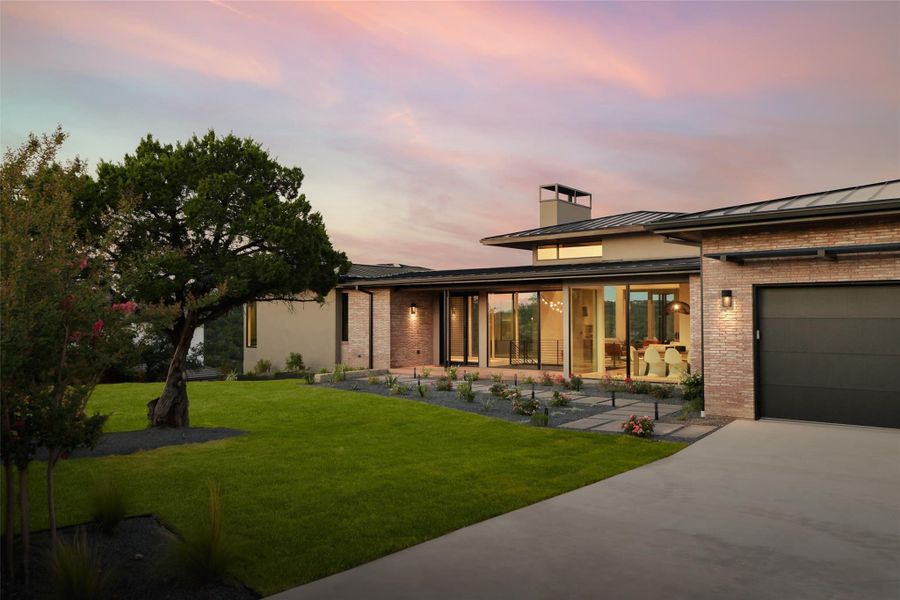 Front exterior of a new home in , Austin, TX, highlighting curb appeal (Image 19). Front exterior of a new home in , Austin, TX, highlighting curb appeal (Image 19).