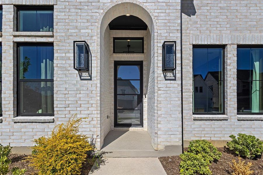 View of exterior entry with brick siding View of exterior entry with brick siding