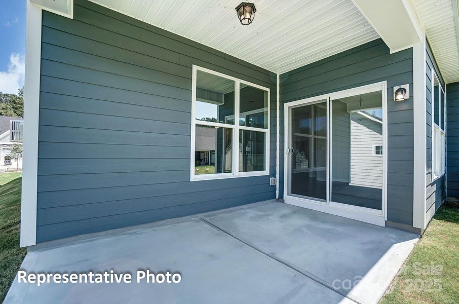 Exterior details and patio area of a home in Villas at Prestwick, Mooresville (Image 20).