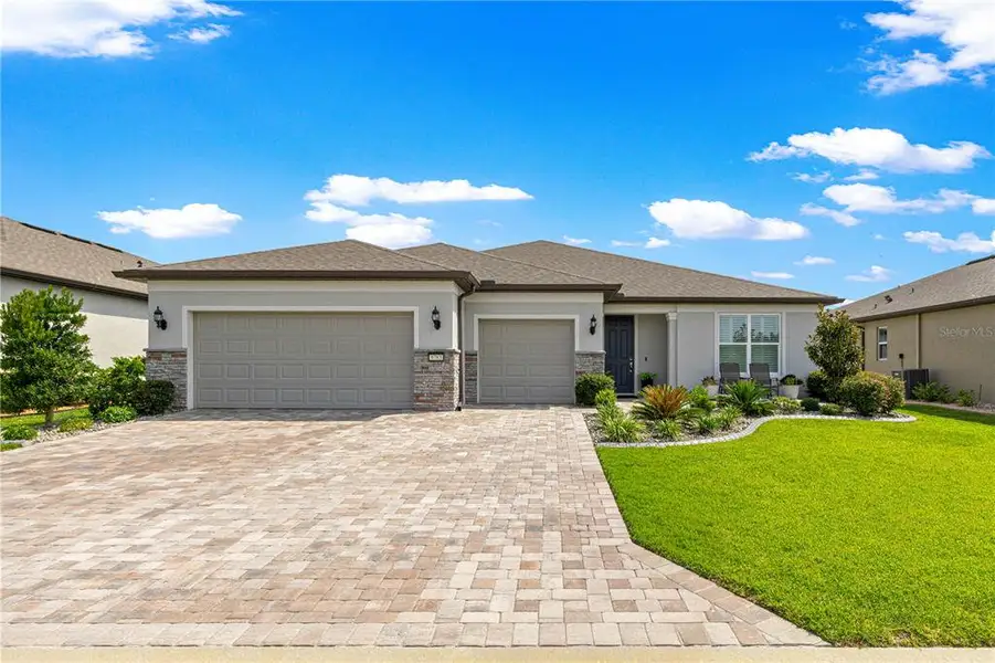 Front exterior of a new home in , Ocala, FL, highlighting curb appeal (Image 22). Front exterior of a new home in , Ocala, FL, highlighting curb appeal (Image 22).