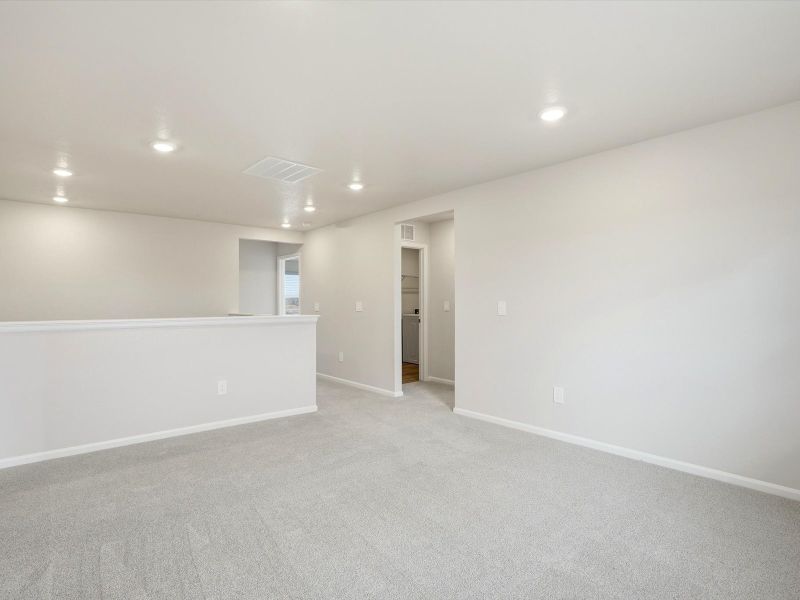 Spacious, unfurnished interior of a new home in Poudre Heights: The Lakes Collection, Windsor (Image 11).