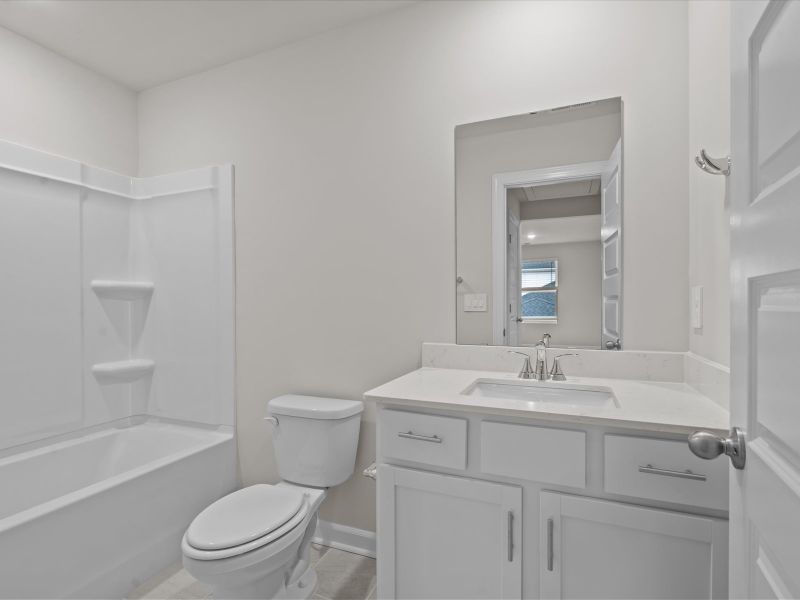 Furnished interior view inside a new home in The Farm at Wells Creek - Heritage Collection, Gray Court (Image 9).