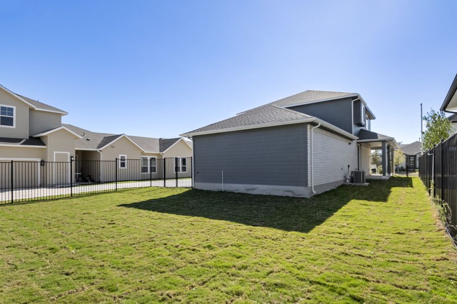 Exterior details and patio area of a home in Easton Park, Austin (Image 33).