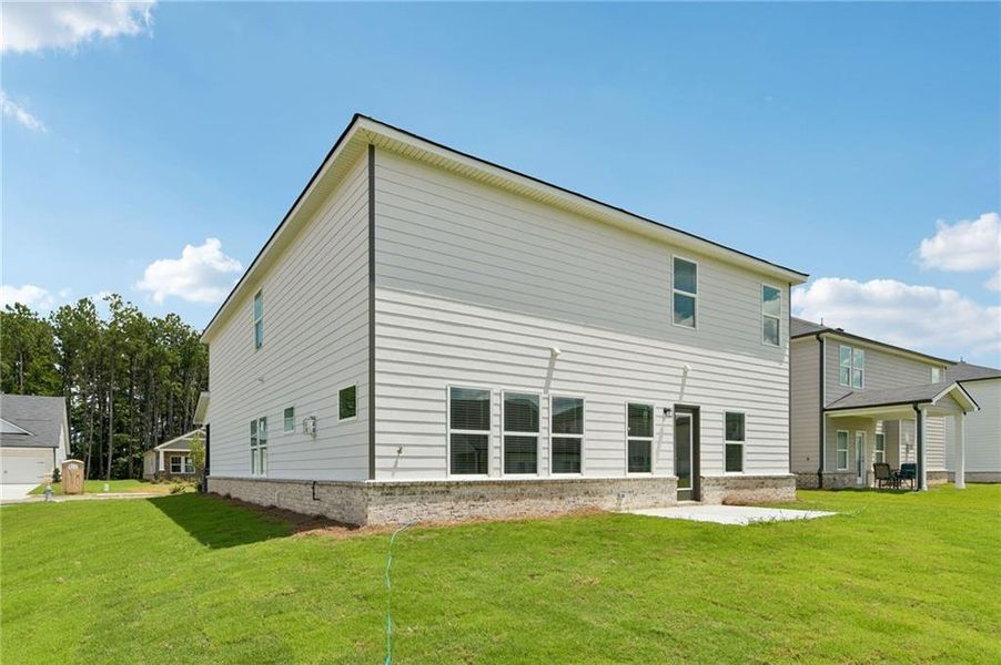 Exterior details and patio area of a home in Parkside at Grayson, Grayson (Image 26).