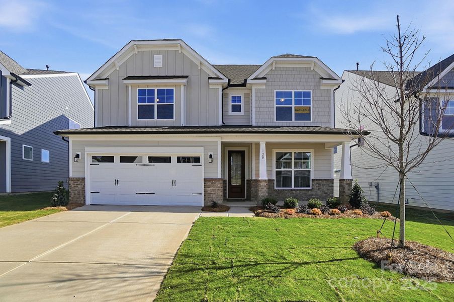 Front exterior of a new home in Summerlin, Mooresville, NC, highlighting curb appeal (Image 1).