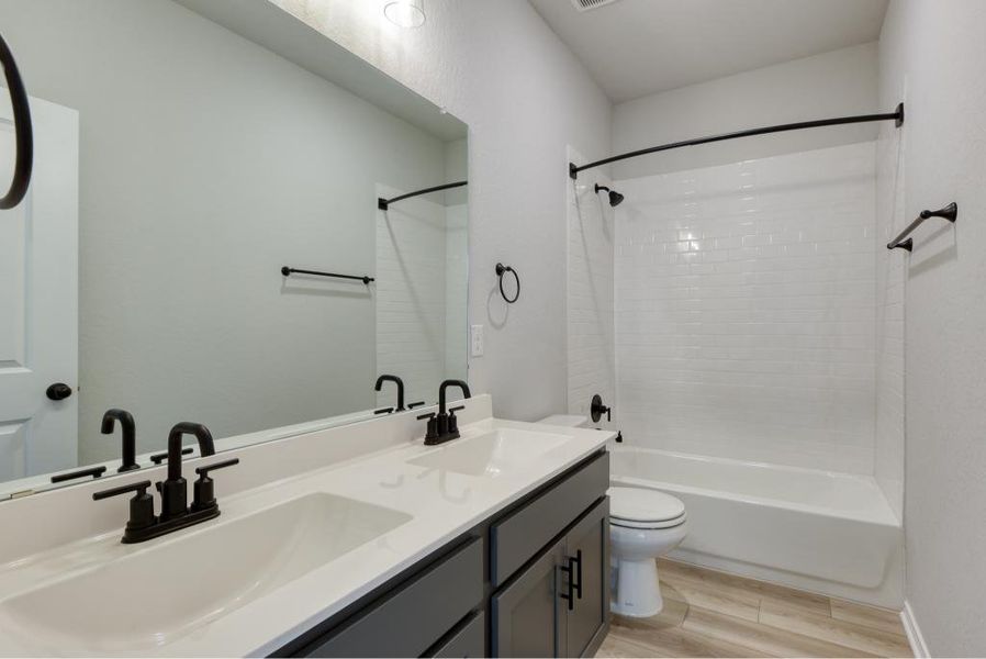 Representative furnished interior of a home built from the Yaupon by Ashton Woods in Arcadia Ridge, San Antonio (Image 5). Representative furnished interior of a home built from the Yaupon by Ashton Woods in Arcadia Ridge, San Antonio (Image 5).