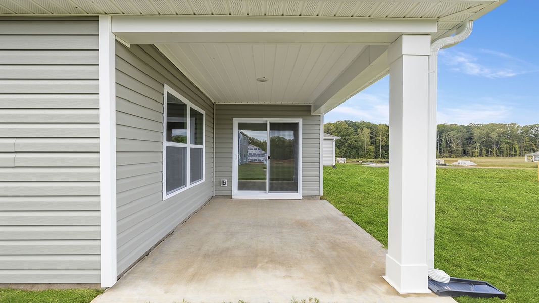 Exterior details and patio area of a home in Gibson Grove, Laurens (Image 17).