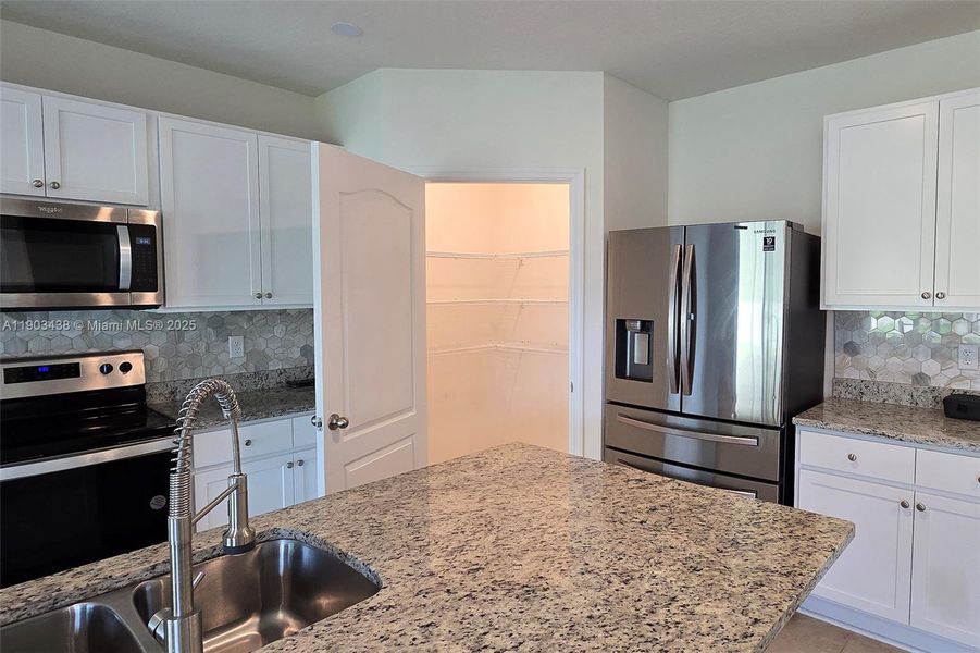 Furnished interior view inside a new home in , Davenport (Image 8).