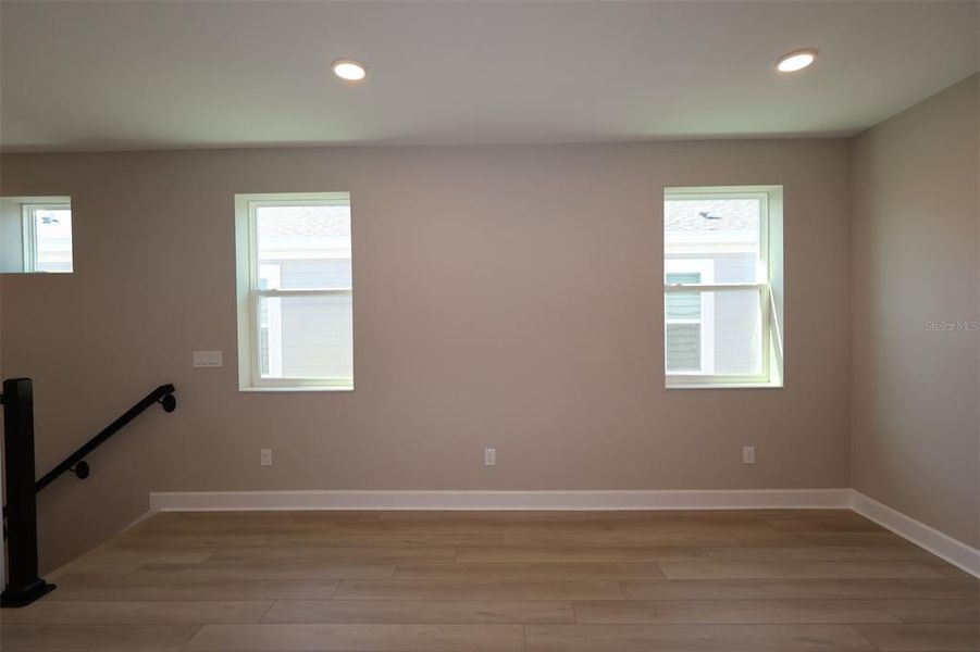 Spacious, unfurnished interior of a new home in Lake Star at Ovation, Winter Garden (Image 25).