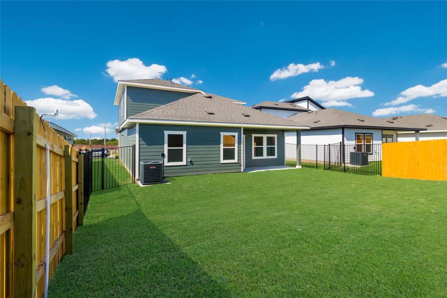 Front exterior of a new home in Trails at Wildhorse, Austin, TX, highlighting curb appeal (Image 17).