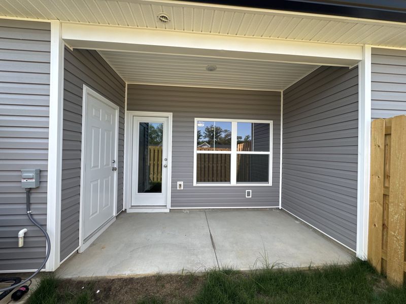 Exterior details and patio area of a home in Caroleton Townhomes, Grovetown (Image 25).