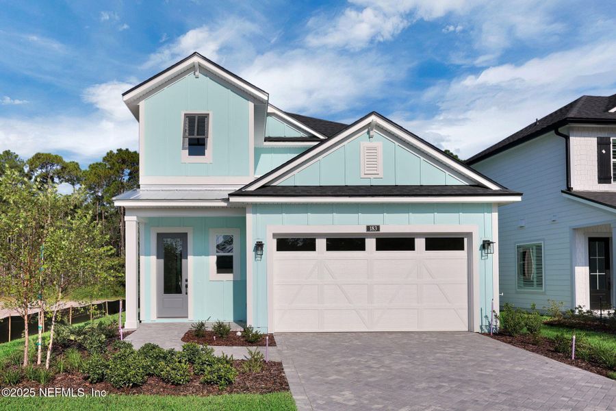 Front exterior of a new home in Reflections at Nocatee, Ponte Vedra, FL, highlighting curb appeal (Image 23).